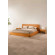 Cama con cabecero en madera de iroko modelo Sol